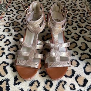 Guess gold and brown wedges size 11, lightly used.